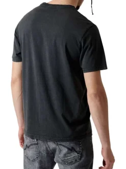 T-shirt en coton noir uni avec une coupe droite et un col rond