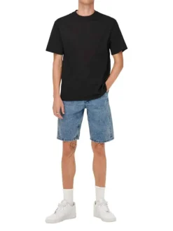 T-shirt en coton noir uni avec une coupe droite et un col rond