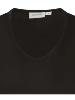 T-shirt en coton noir uni avec une coupe droite et un patch iconique