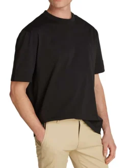 T-shirt en coton noir uni col rond et avec nom de la marque dans le dos
