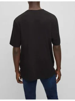 T-shirt en coton noir uni coupe droite avec un col rond et liseré orange