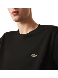 T-shirt en coton noir uni coupe droite avec un col rond et logo brodé