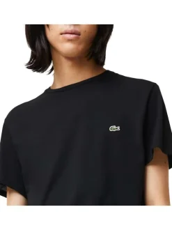 T-shirt en coton noir uni coupe droite avec un col rond et logo brodé