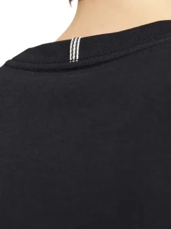 T-shirt en coton noir uni à coupe droite avec une écriture en relief