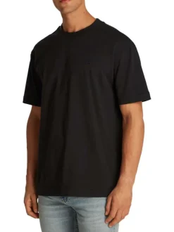 T-shirt en coton noir uni à coupe oversize avec un imprimé logo à l'arrière