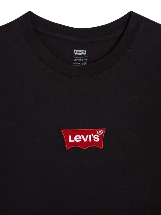 T-shirt en coton noir uni droit à col rond avec étiquette de la marque
