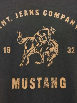 T-shirt en coton noir uni pourvu d'un imprimé centré sur la poitrine
