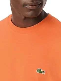 T-shirt en coton orange à coupe droite pourvu d'un col rond côtelé