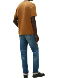 T-shirt en coton orange pourvu d'un col rond et de manches courtes