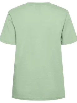 T-shirt en coton pistache uni avec une coupe droite et un col rond