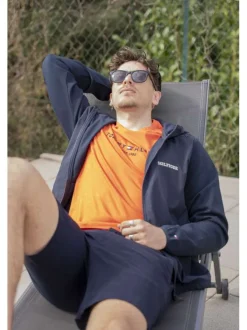 T-shirt en coton régénératif orange avec imprimé de la marque et coupe droite