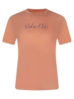 T-shirt en coton rose à coupe droite avec un col rond et texte sur la poitrine