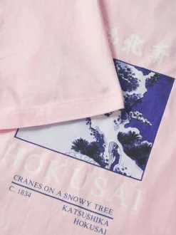 T-shirt en coton rose à coupe droite pourvu d'un col rond côtelé