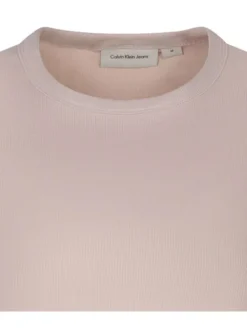 T-shirt en coton rose uni avec une coupe droite et un col rond