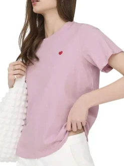 T-shirt en coton rose uni avec une coupe droite et un col rond