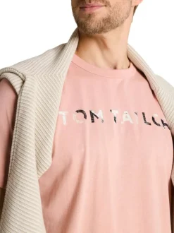 T-shirt en coton rose uni pourvu d'un col rond et d'une coupe droite