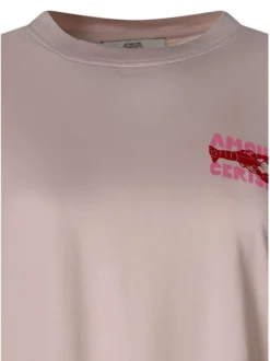 T-shirt en coton rose uni pourvu d'une coupe ample et d'un col rond