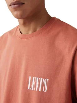 T-shirt en coton rouille uni à coupe oversize avec le nom de la marque imprimé