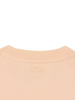 T-shirt en coton saumon à coupe droite pourvu d'un col rond texturé