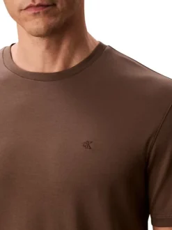 T-shirt en coton taupe uni coupe ajustée col rond avec un logo brodé