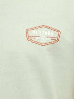 T-shirt en coton vert d'eau uni avec une coupe droite et un col rond