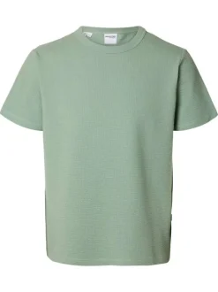 T-shirt en gaze de coton vert uni avec un col rond et une coupe droite