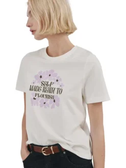 T-shirt en lin écru uni pourvu d'une coupe droite et d'un col rond