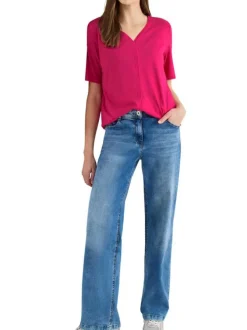 T-shirt fuchsia uni pourvu de manches courtes et d'une coupe droite