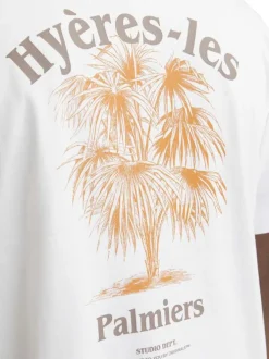 T-shirt manches courtes en coton blanc avec col rond et palmiers imprimés au dos