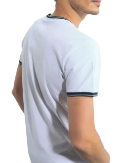 T-shirt manches courtes en coton blanc uni avec une coupe droite et un col rond