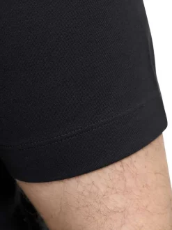 T-shirt manches courtes noir uni avec une coupe droite et un col rond