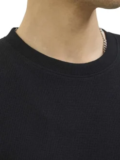 T-shirt à manches courtes noir uni avec une coupe droite et un col rond