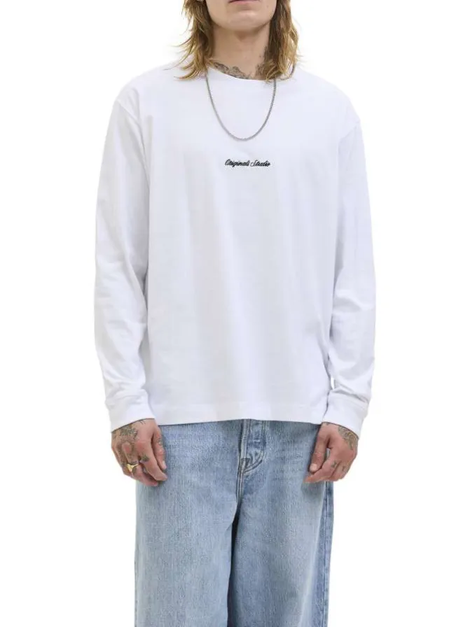 T-shirt à manches longues en coton blanc uni à coupe droite avec un col rond