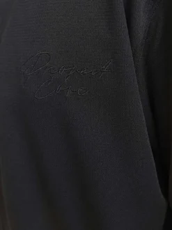 T-shirt noir uni avec une coupe droite à col v et des manches courtes