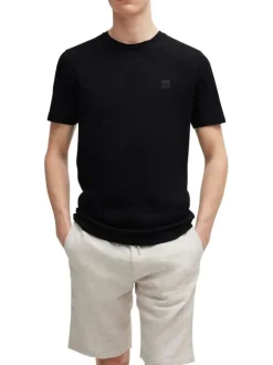 T-shirt noir uni à coupe droite et à col rond avec un petit patch carré