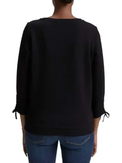T-shirt noir uni en maille texturée avec un col rond et des manches longues