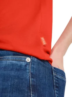 T-shirt orange uni pourvu de manches courtes et d'un col rond