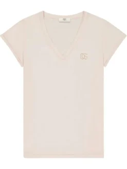 T-shirt rose à coupe droite pourvu d'un col v et de manches courtes