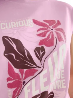T-shirt rose uni pourvu de manches courtes et d'une coupe droite
