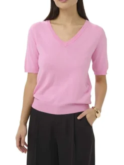 T-shirt rose uni pourvu d'une coupe ajustée et de manches courtes