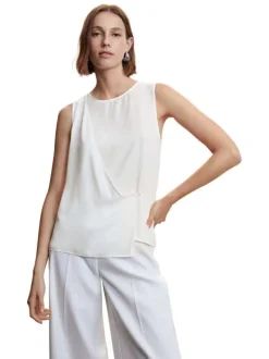 T-shirt sans manches blanc uni avec une coupe asymétrique et un col rond