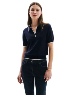 T-shirt type polo bleu marine uni avec un col v à revers et des liserés blancs