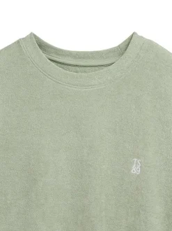 T-shirt vert à coupe droite pourvu d'un col rond et de manches courtes