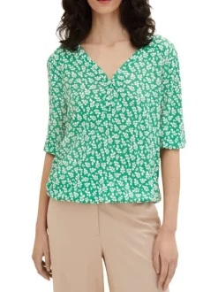 T-shirt vert fleuri coupe droite avec un col v et des manches longues
