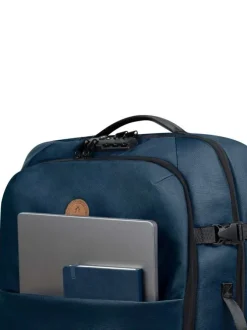 Valise bleue unie à roulettes pourvue d'une fermeture zippée et à code