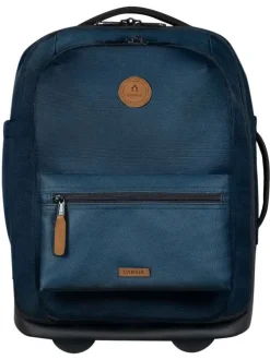 Valise bleue unie à roulettes pourvue d'une poignée télescopique
