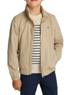 Veste beige uni avec une coupe droite à col montant et fermeture zippée