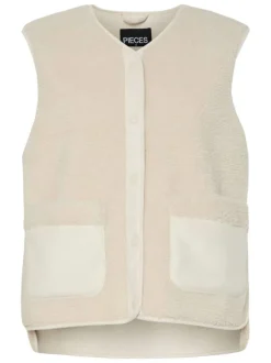 Veste beige unie sans manche avec un col v et boutons-pression à l'avant