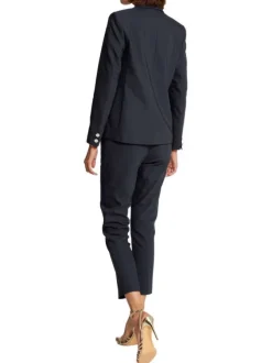Veste blazer marine unie avec une coupe droite et des manches longues