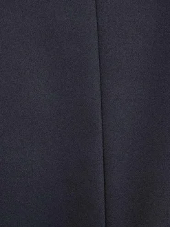 Veste blazer marine unie avec une coupe droite et des manches longues